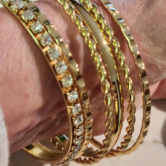 Gold tone set of bangle bracelets - Picture 2 of 5